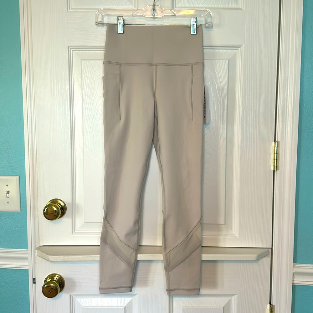 Athleta Salutation Stash Mesh Tight